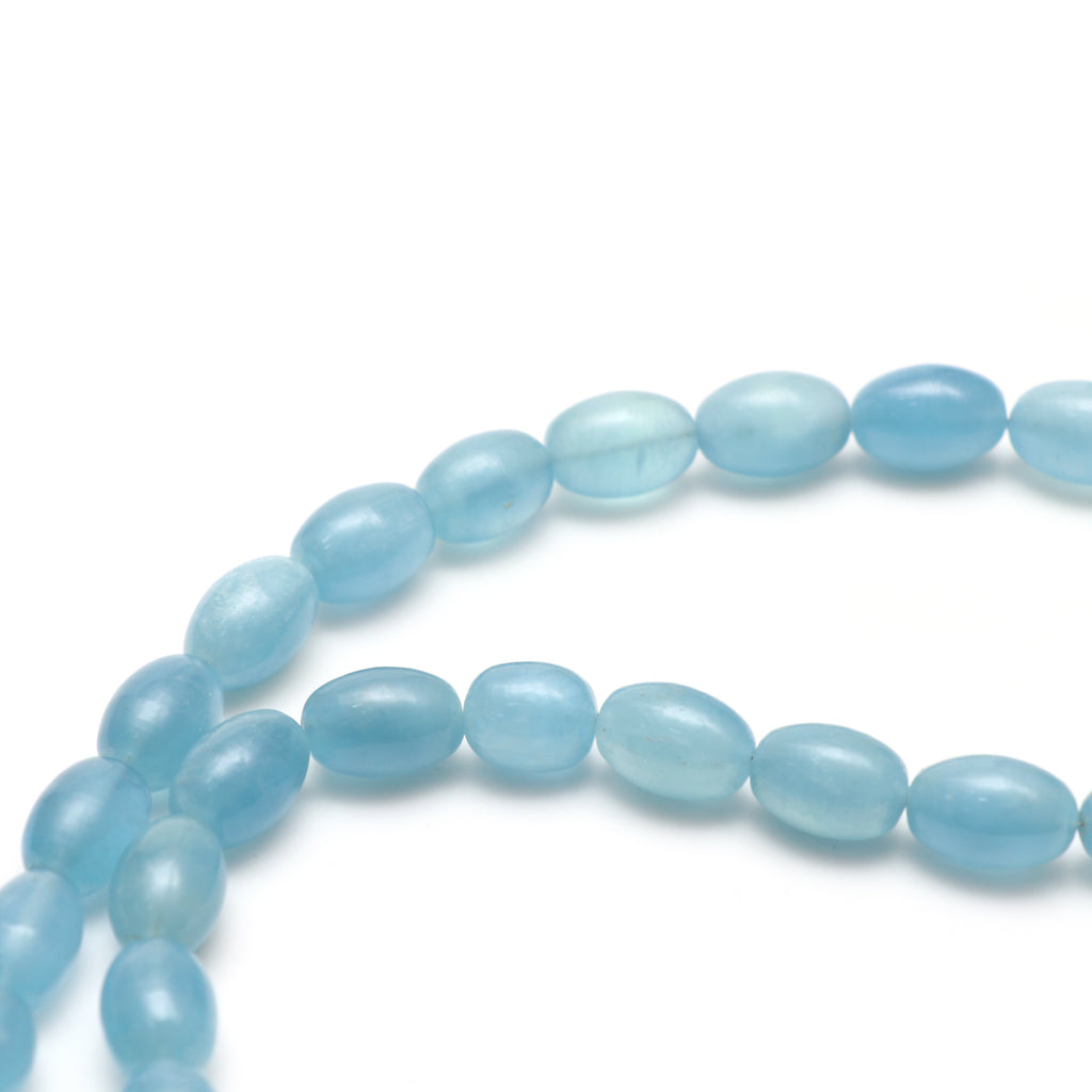 Stabilized Aquamarine Smooth Barrel Beads, 10x13 mm to 11x16 mm, Aquamarine Barrel Jewelry Making Gemstone, Price Per Strand - National Facets, Gemstone Manufacturer, Natural Gemstones, Gemstone Beads, Gemstone Carvings